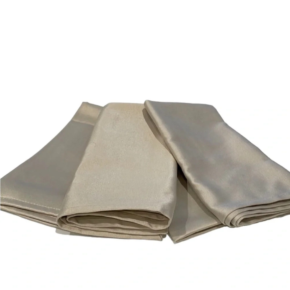 Set of 4 coated napkins in taupe. New.